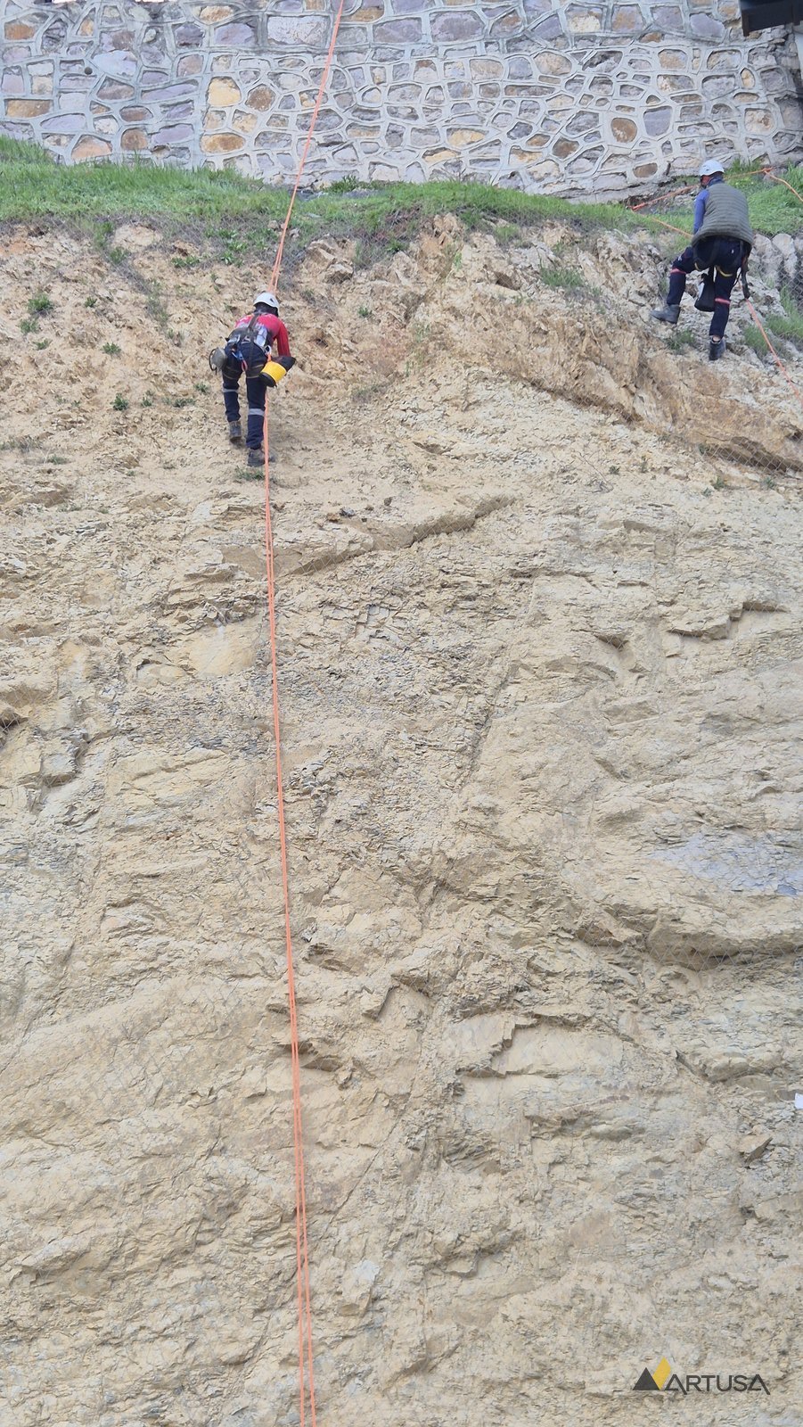 Two rope lines on a rock face